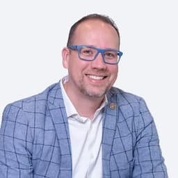 Portrait of Justin Fawson, Partner, Operations & Government Relations